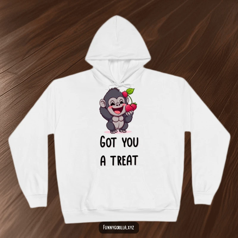 Funny Hoodie of a happy gorilla character excitedly presenting a berry with a wide, joyful grin, ideal for staying warm and cheerful.